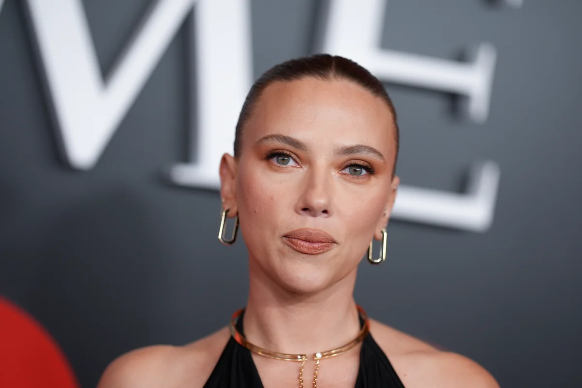 Scarlett Johansson as Black Widow in a dramatic scene.