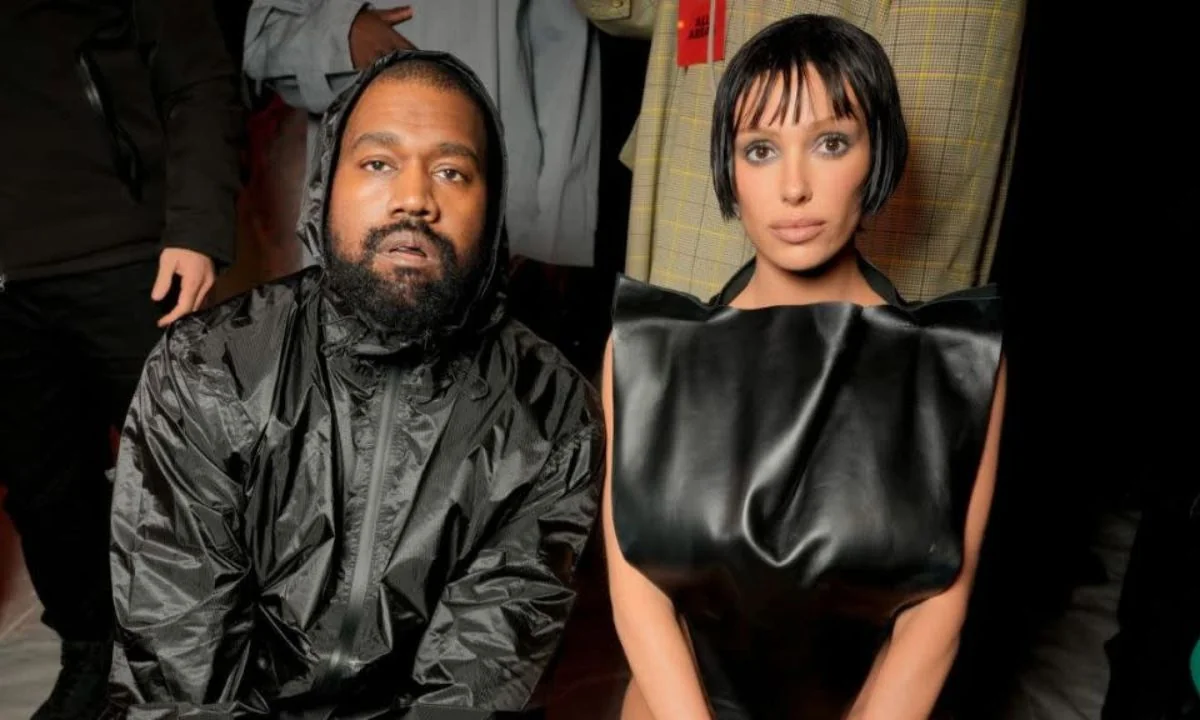 Kanye West and Bianca Censori at a fashion event amid divorce rumors.