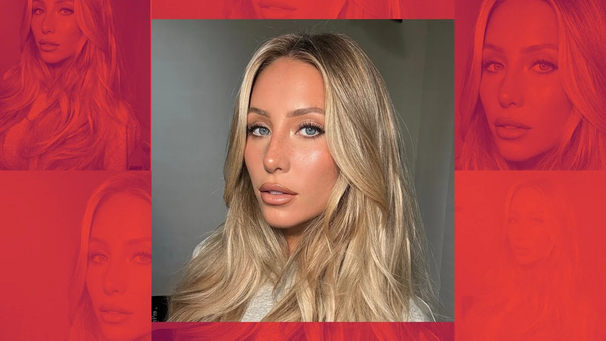 Alix Earle acting with a natural look and flowing hair.