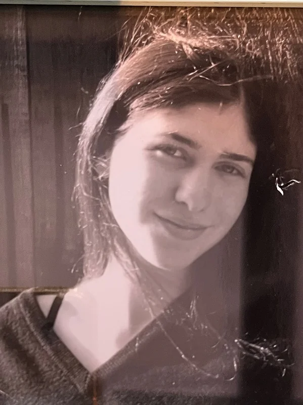 Michelle Trachtenberg early career portrait, smiling softly as a child actress