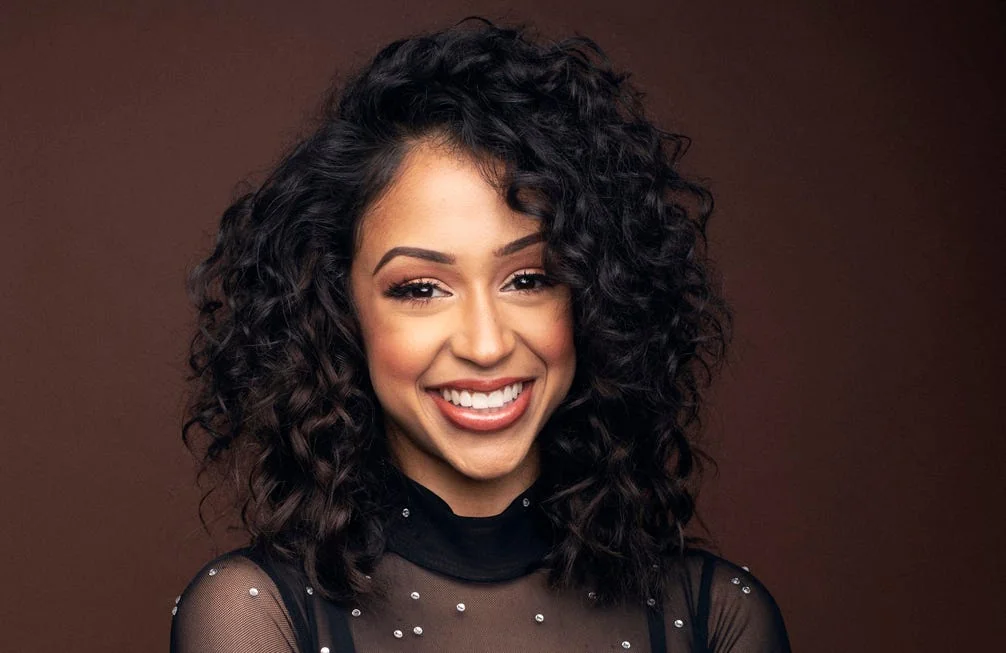 Liza Koshy smiling, showcasing her charm in liza koshy movies.