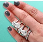 Close-up of rings, showcasing styles similar to Zooey Deschanel engagement ring.