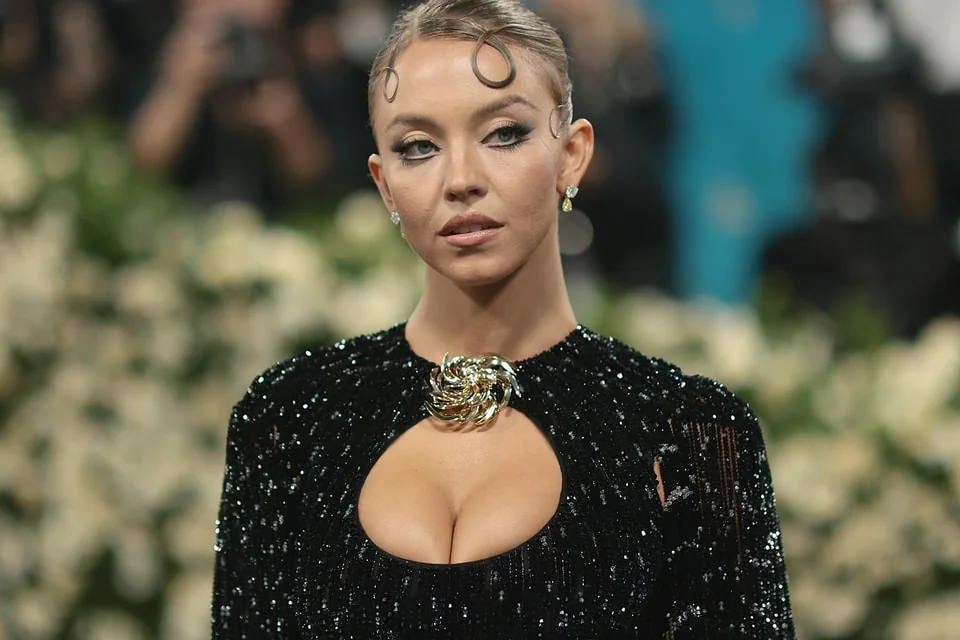 Sydney Sweeney on a red carpet in 2025, signaling a massive year of movie releases