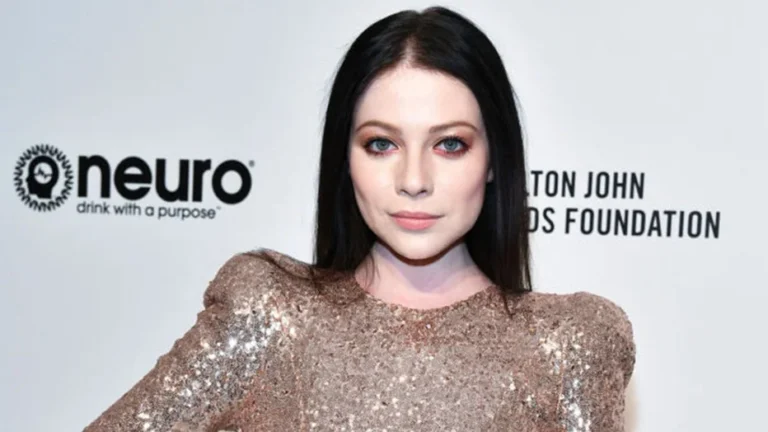 Michelle Trachtenberg at charity event, reflecting her life and contributions.