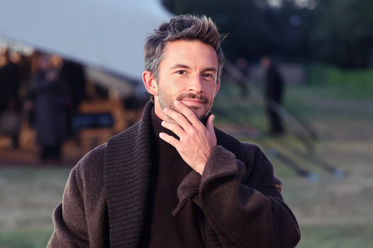 Jonathan Bailey's stylish evolution as he is crowned People's Sexiest Man Alive 2025.