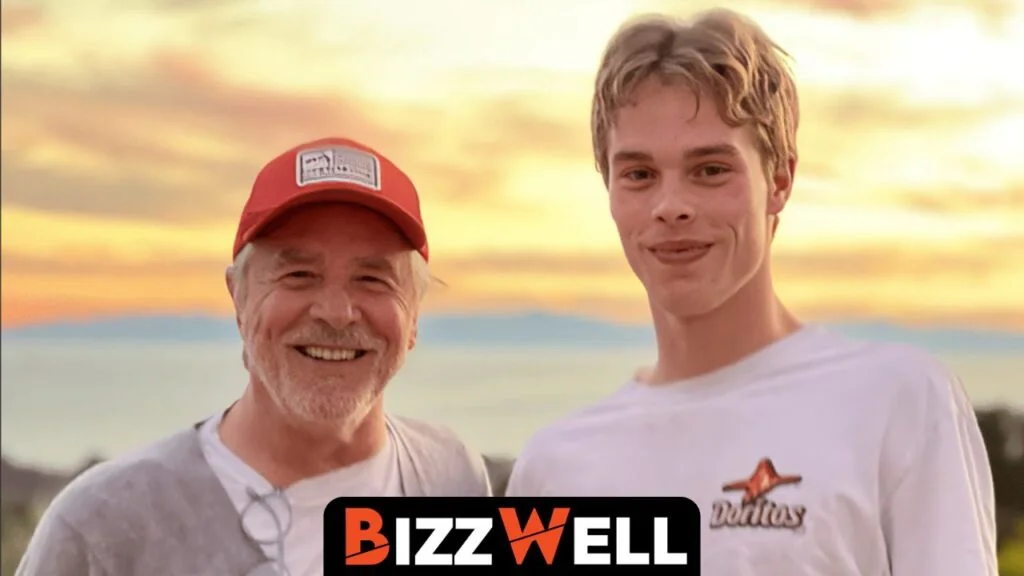 Jasper Breckenridge Johnson smiling with a friend at sunset.