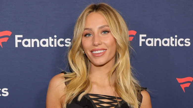 Alix Earle at a public event, radiating red-carpet-ready charm and modern glam