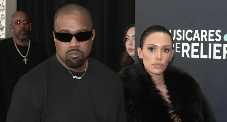 Kanye West and Bianca Censori at an event amid divorce speculation.