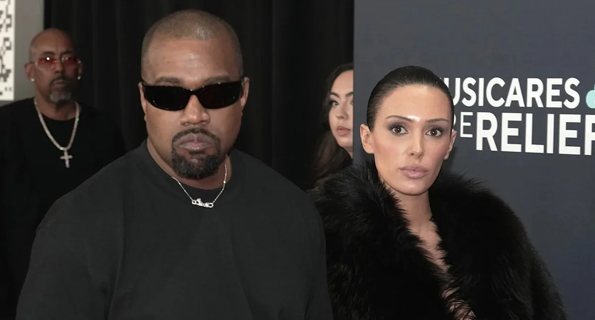 Kanye West and Bianca Censori at an event amid divorce speculation.