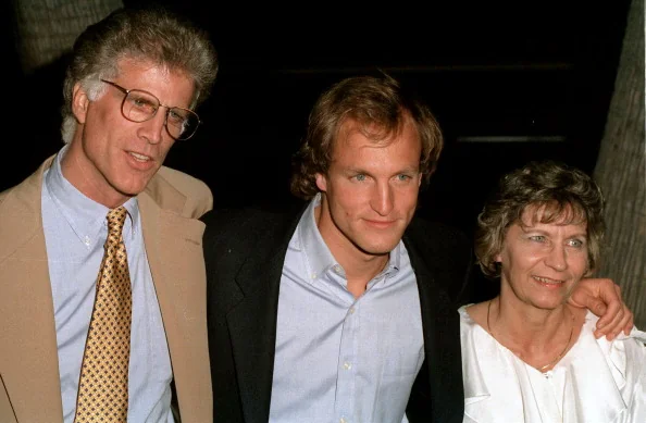 Woody Harrelson with his parents, reflecting family ties.