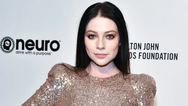 Michelle Trachtenberg at a community fundraiser, symbolizing her advocacy and outreach