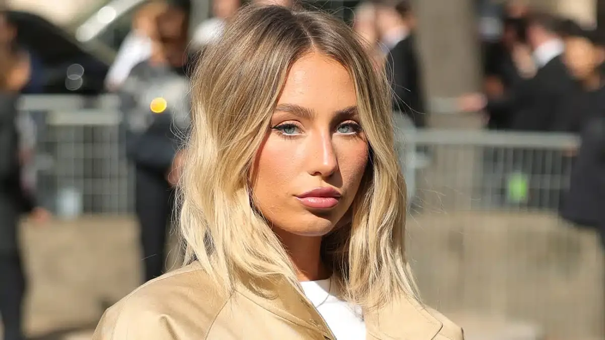 Flat lay of dewy makeup essentials ideal for on-camera radiance, inspired by Alix’s screen glow