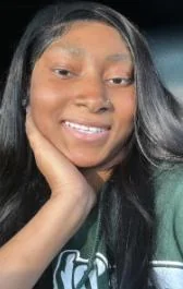 Dashayla Ardoin smiling in a close-up selfie.