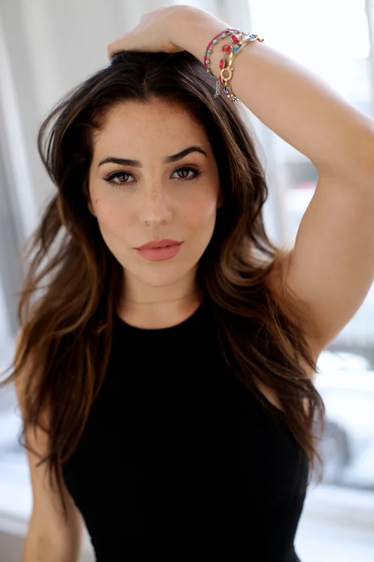 Audrey Esparza in a casual pose, showcasing her relaxed style.