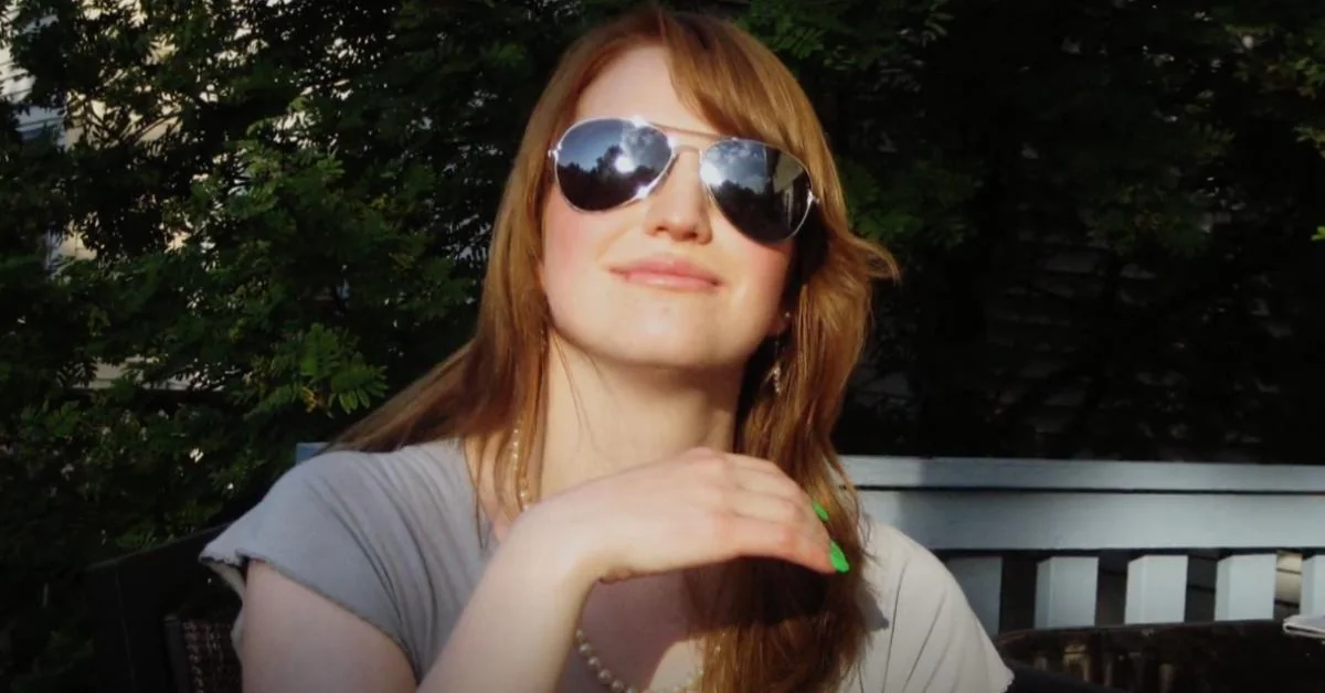 Woman reflecting on 'joshua burgess parole denied' and its implications.