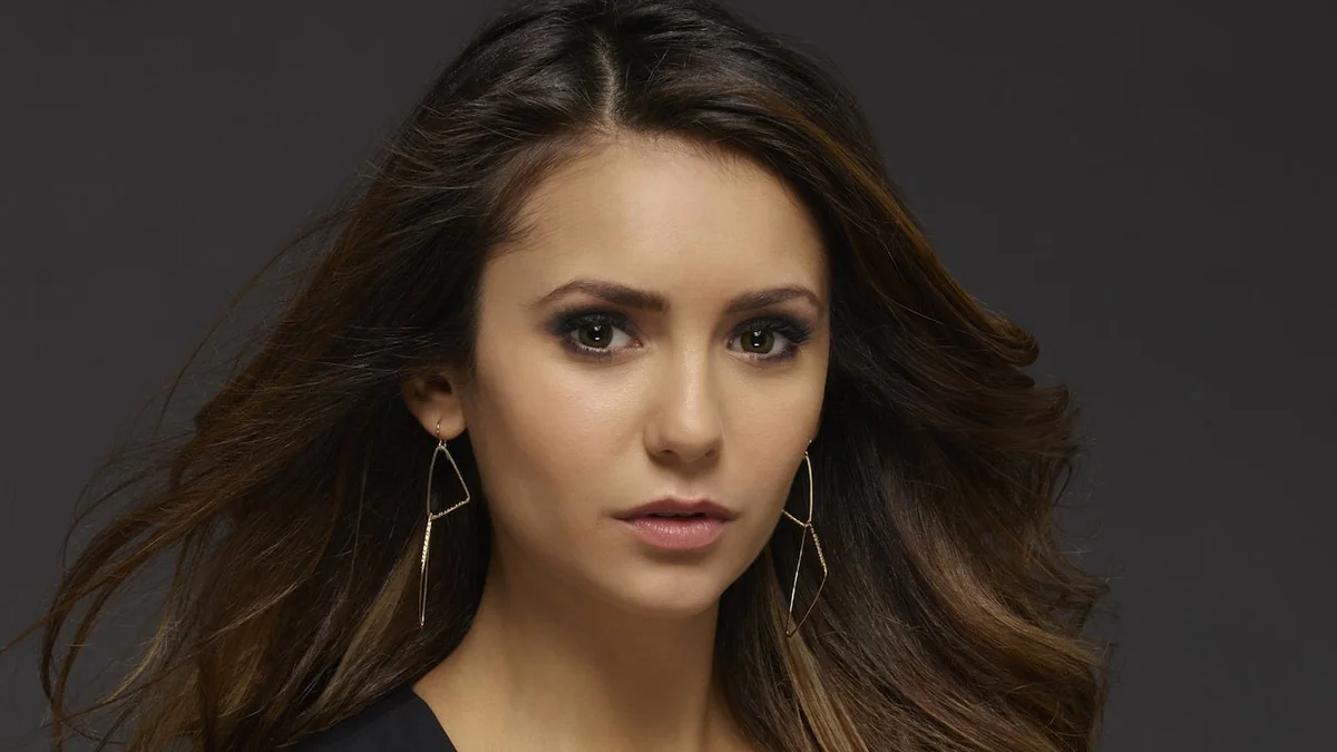 Close-up of Nina Dobrev, showcasing her elegance in movies.