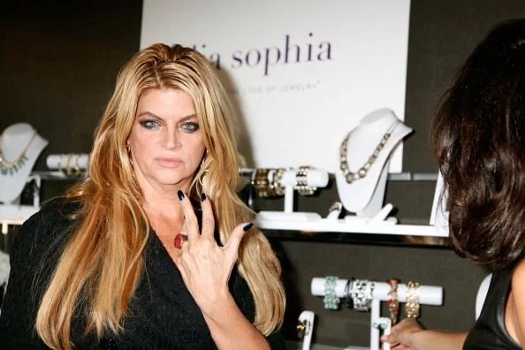 Kirstie Alley at a jewelry showcase, highlighting her business ventures related to kirstie alley net worth 2025.