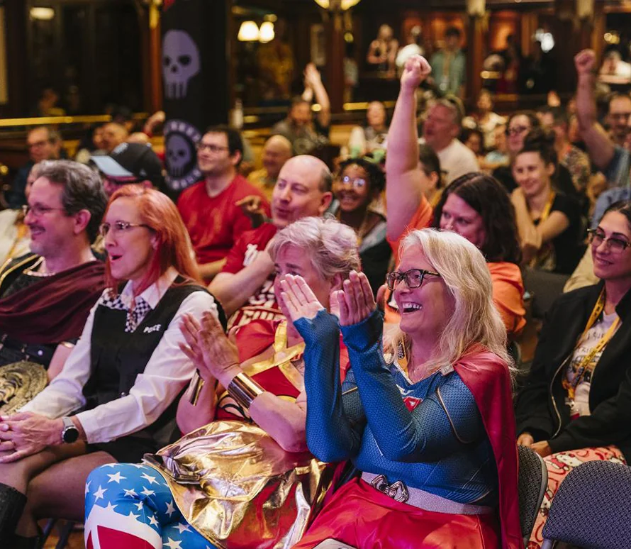 Crowd celebrating at an event, showcasing community engagement.
