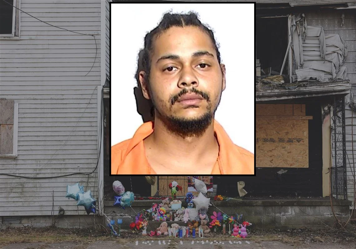 Memorial for keimani latigue found outside a damaged home.