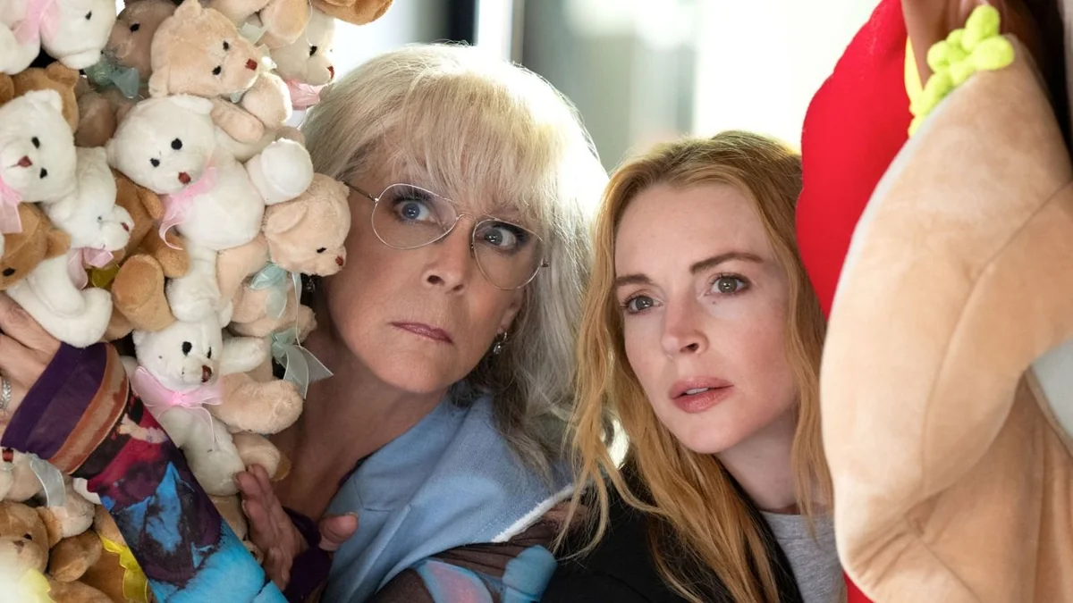 Jamie Lee Curtis and Lindsay Lohan in a playful scene.