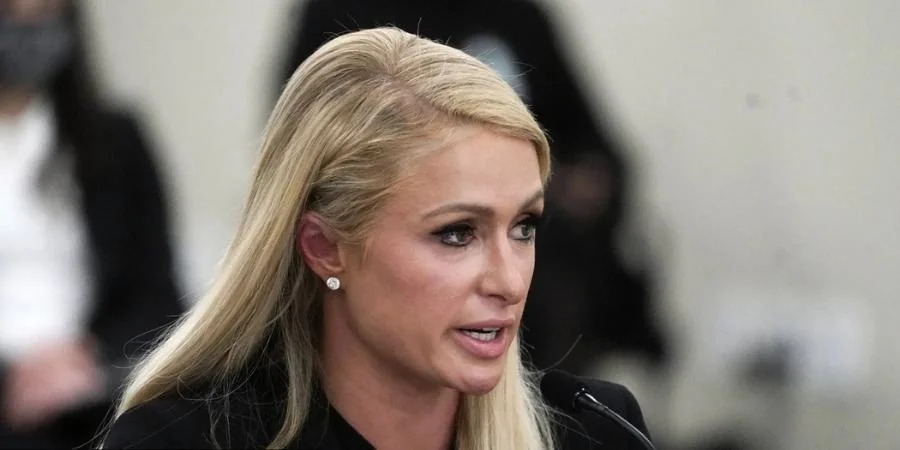 Paris Hilton testifying, showcasing her advocacy and impact on net worth.