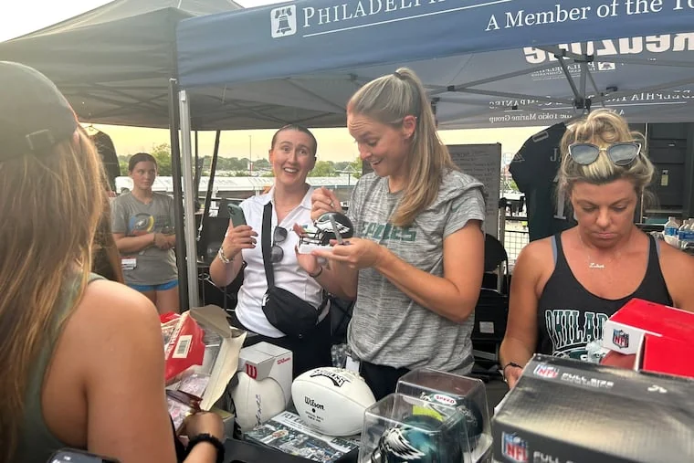 Kylie Kelce interacting with fans during her Olympics gig.