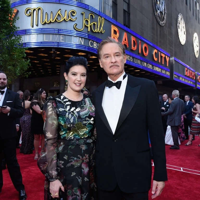 Phoebe Cates at a prestigious venue, relating to her net worth.