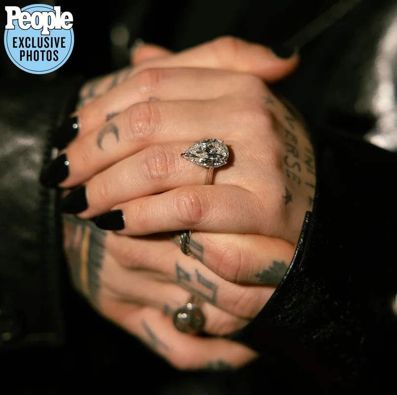 Another close-up angle of Demi Lovato engagement ring focusing on the teardrop diamond