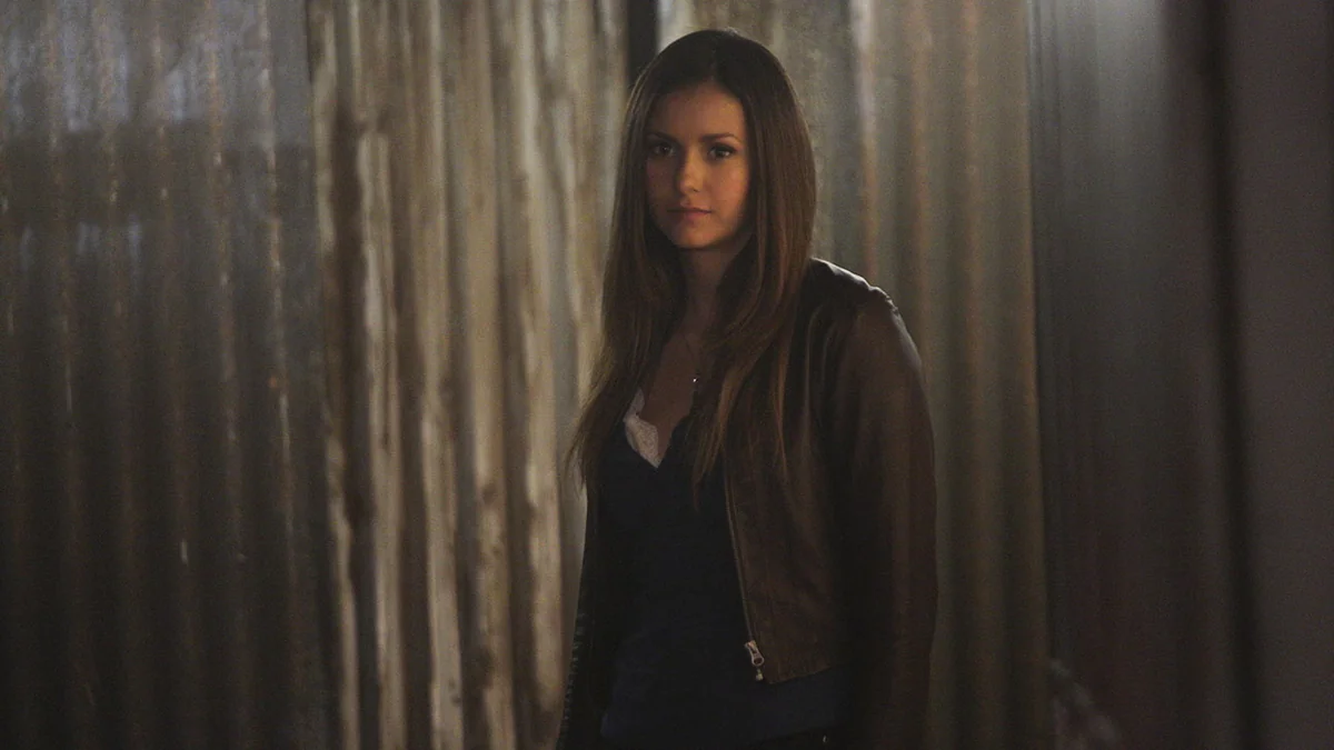 Nina Dobrev in a dramatic movie scene, showcasing her acting range.