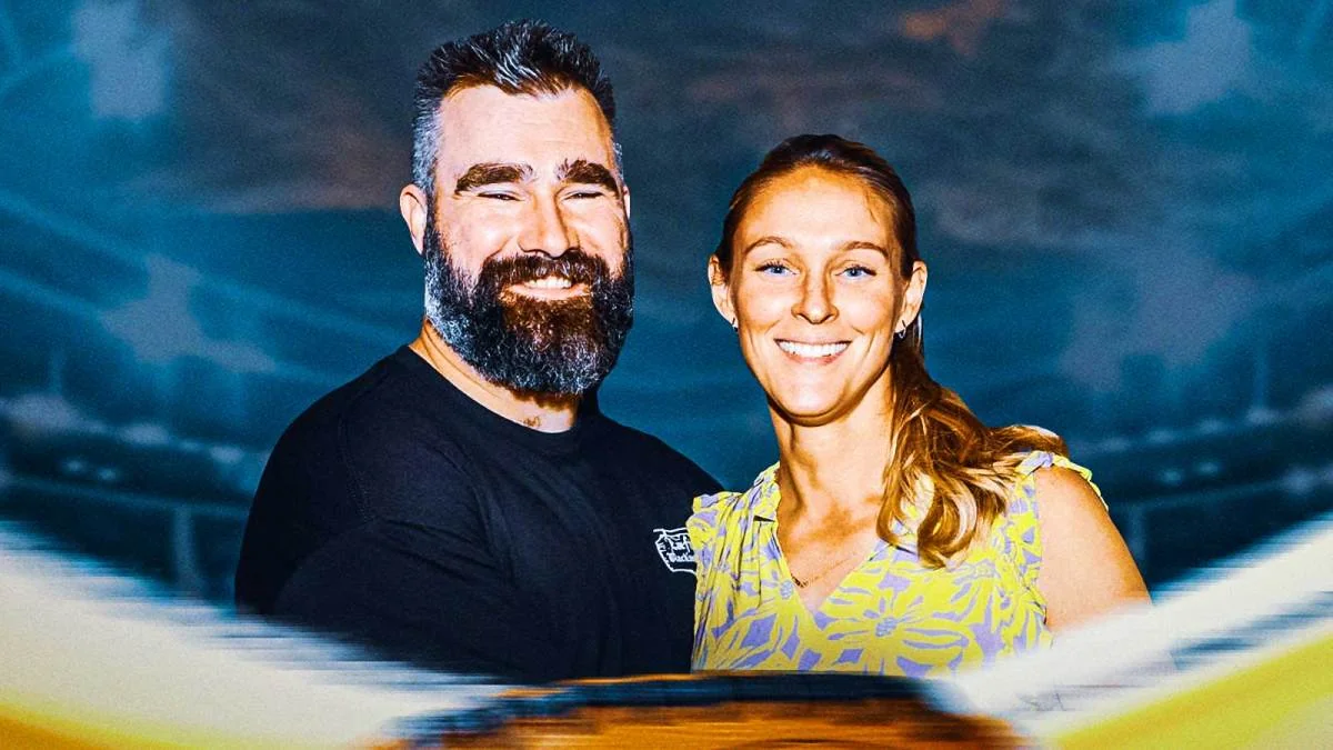 Kylie Kelce and her partner smiling, showcasing their bond during her Olympics gig.